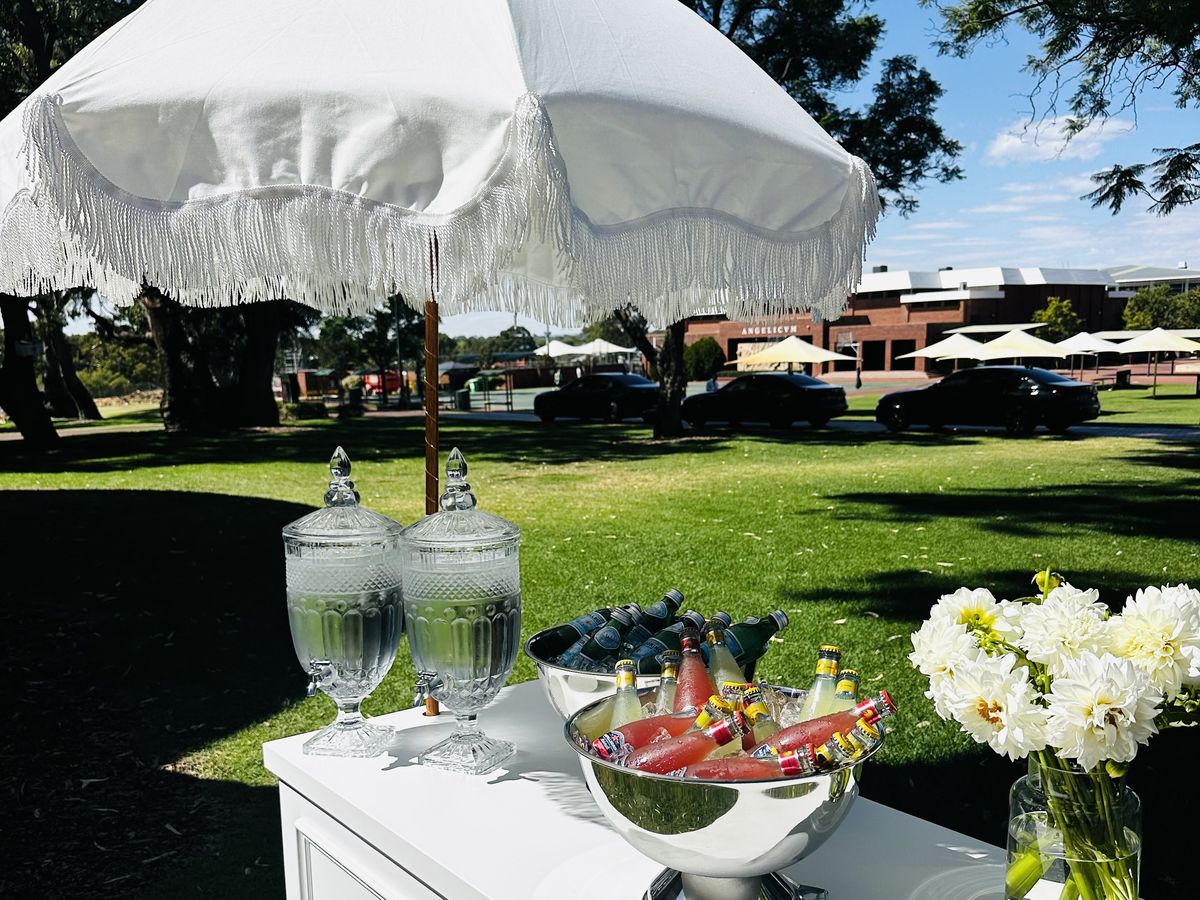 Drinks and grazing carts at outdoor wedding cocktail hour