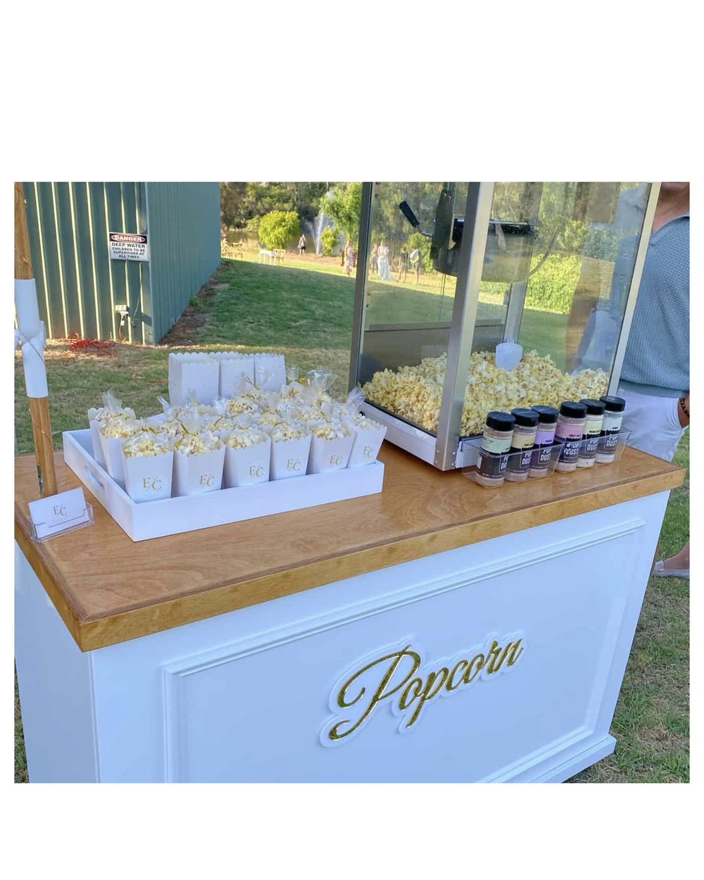Popcorn cart with branded E/C bags, popcorn machine, and gourmet flavour dusts
