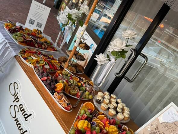 Sip and Snack cart with fruit platters and refreshments